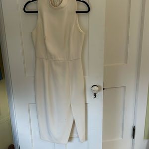 Exquisitely made and designed off white multi purpose dress!